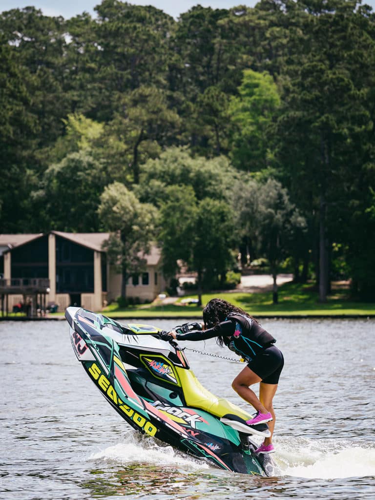 Women riding a sea-doo spark on a lake